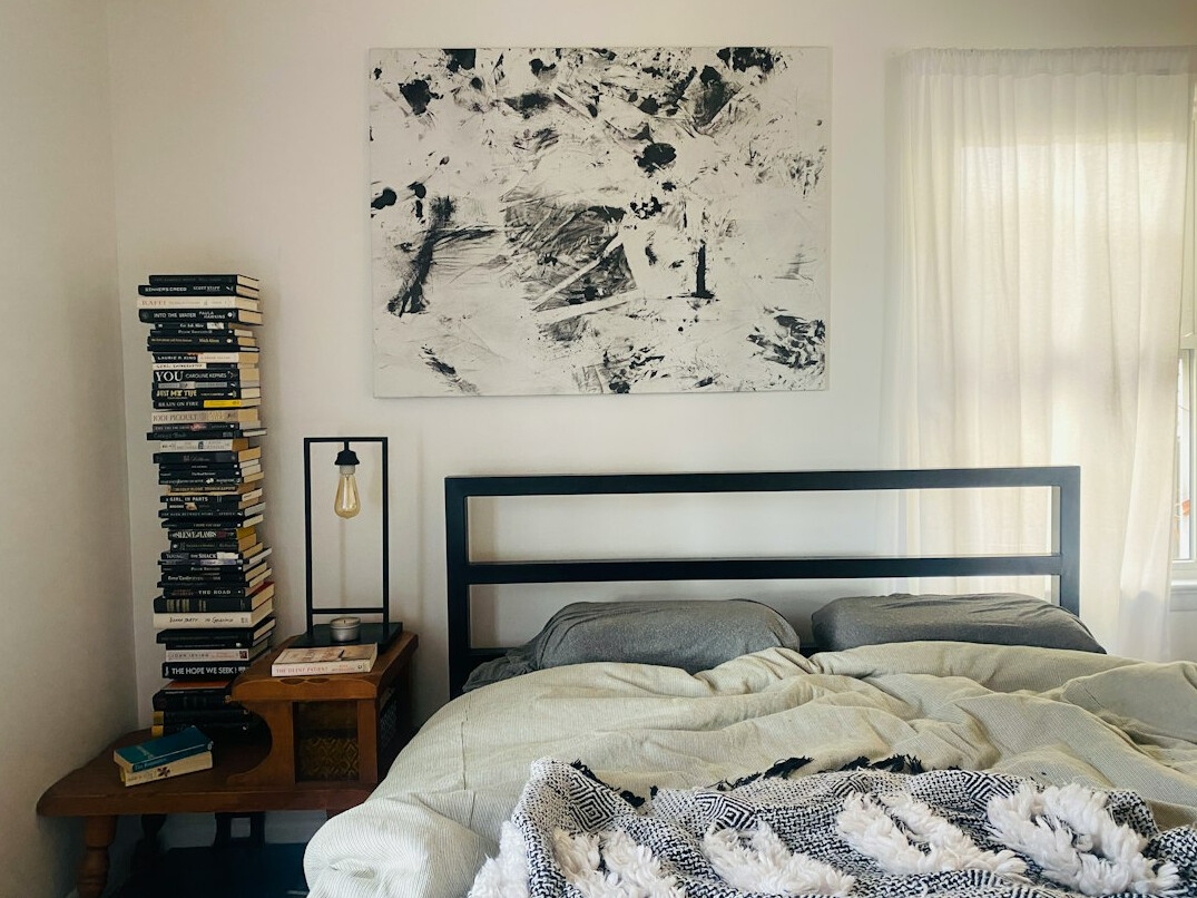celebrity bedroom with art